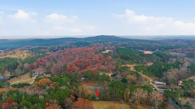 an aerial view of residential house and outdoor space
