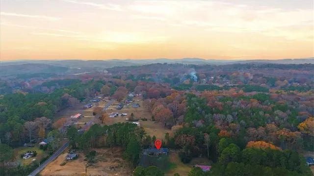 an aerial view of residential house and outdoor space