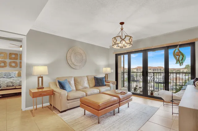 a living room with furniture and a table