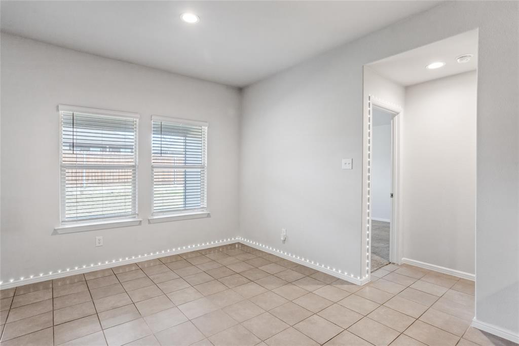 424 Amory Street Azle, TX 76020 - Photo 12 of 27 an empty room with windows
