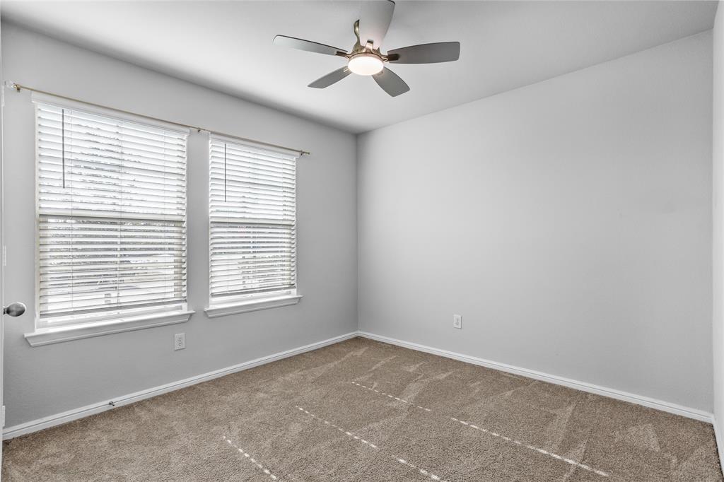 424 Amory Street Azle, TX 76020 - Photo 15 of 27 a view of an empty room with a window