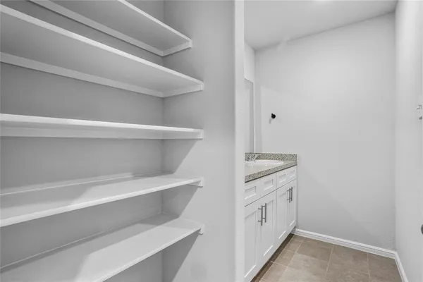 a view of an empty walk in closet