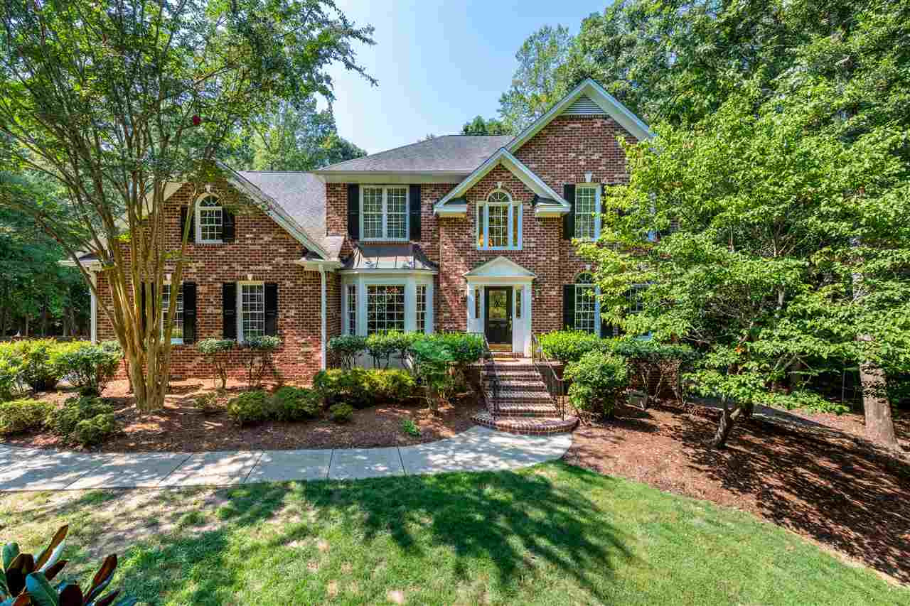 1424 Paumier Court Raleigh, NC 27615 - Photo 1 of 30 Mature Landscaping Complements the Stately Brick Front Front Elevation