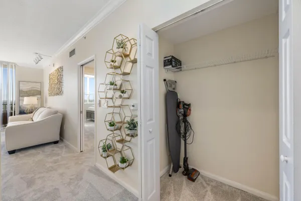 a view of a livingroom with furniture and front door