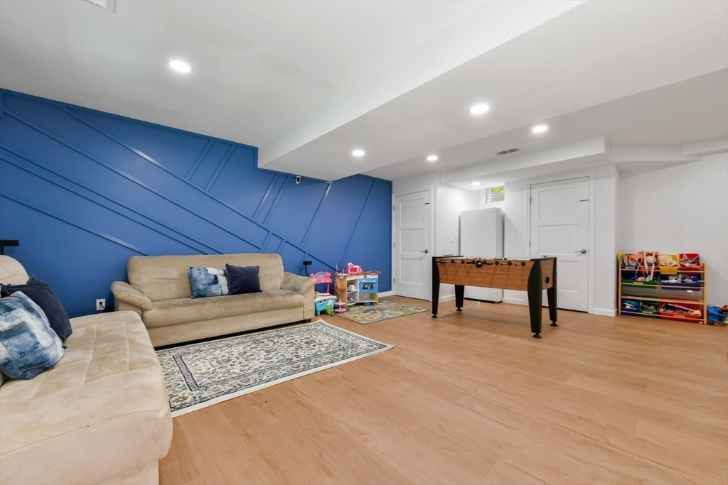 10 Farrow Street Winchester, MA 01890 - Photo 23 of 33 a living room with furniture and a table