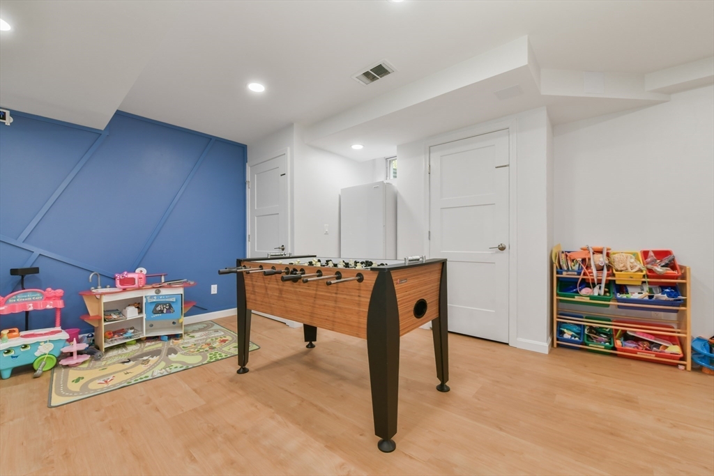 10 Farrow Street Winchester, MA 01890 - Photo 25 of 33 a room with furniture and a table