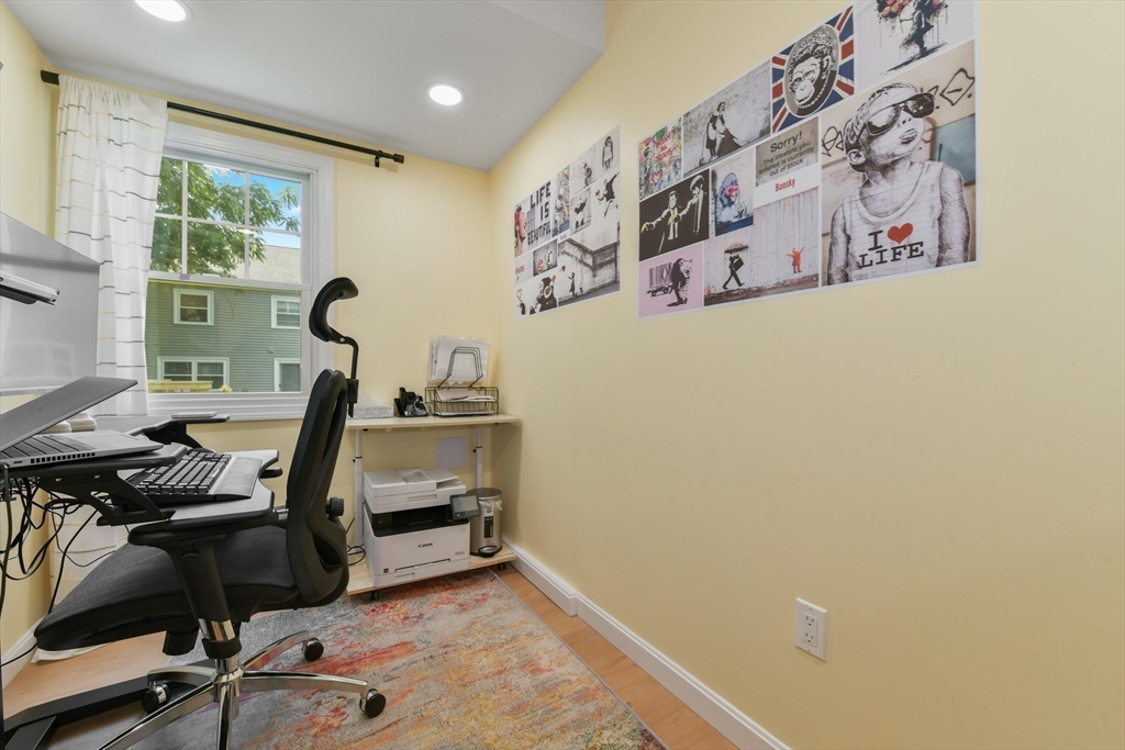 10 Farrow Street Winchester, MA 01890 - Photo 26 of 33 a view of a room with gym equipment