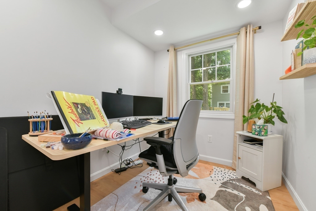 10 Farrow Street Winchester, MA 01890 - Photo 27 of 33 a workspace with furniture and a potted plant