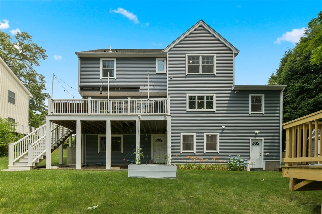 10 Farrow Street Winchester, MA 01890 - Photo 29 of 33 a front view of a house with a yard