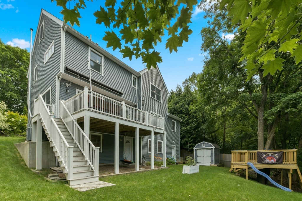 10 Farrow Street Winchester, MA 01890 - Photo 30 of 33 a view of a house with a yard