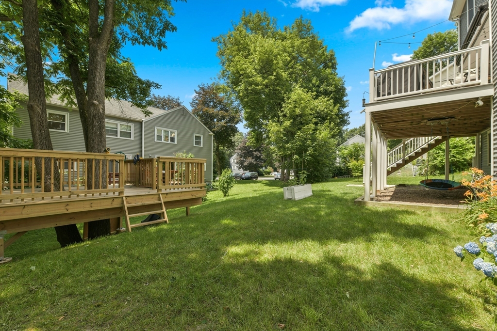 10 Farrow Street Winchester, MA 01890 - Photo 31 of 33 a view of a house with a yard balcony and wooden fence