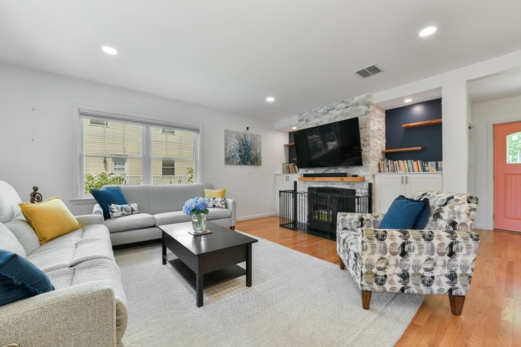 10 Farrow Street Winchester, MA 01890 - Photo 10 of 33 a living room with furniture and a flat screen tv