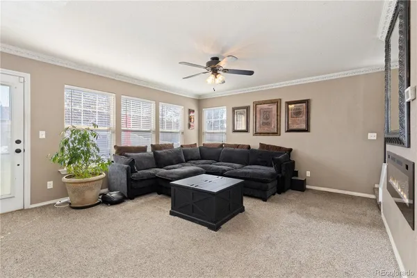 a living room with furniture and a window