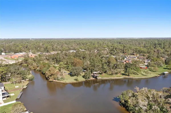 an aerial view of valley and lake