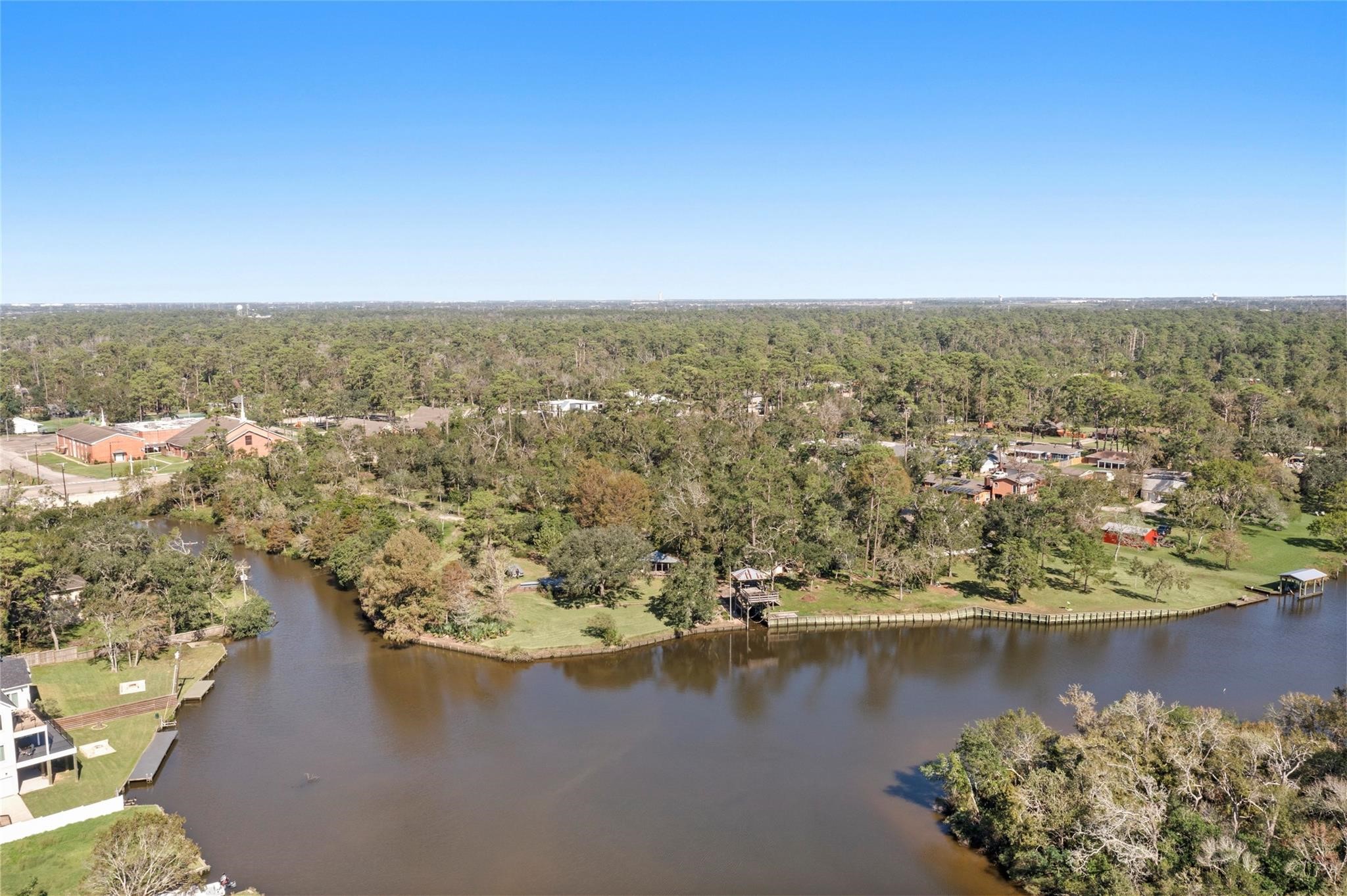 an aerial view of valley and lake