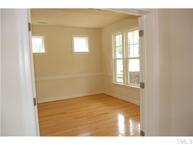 912 Pirouette Court Raleigh, NC 27606 - Photo 9 of 17 Downstairs flex room-PHOTO is REPRESENTATIONAL color/options may vary.