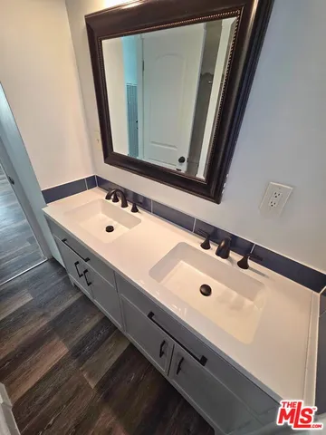 a view of a two chairs in the balcony