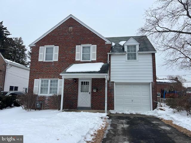 825 Stanbridge Road Drexel Hill, PA 19026 - Photo 1 of 4 a front view of a house with a yard