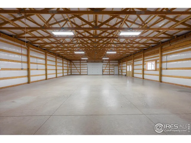a view of a room with wooden walls