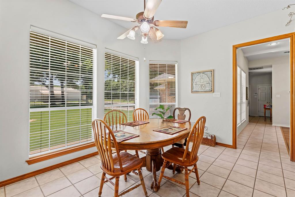 145 Indian Trail Decatur, TX 76234 - Photo 13 of 40 a dining room with furniture and window