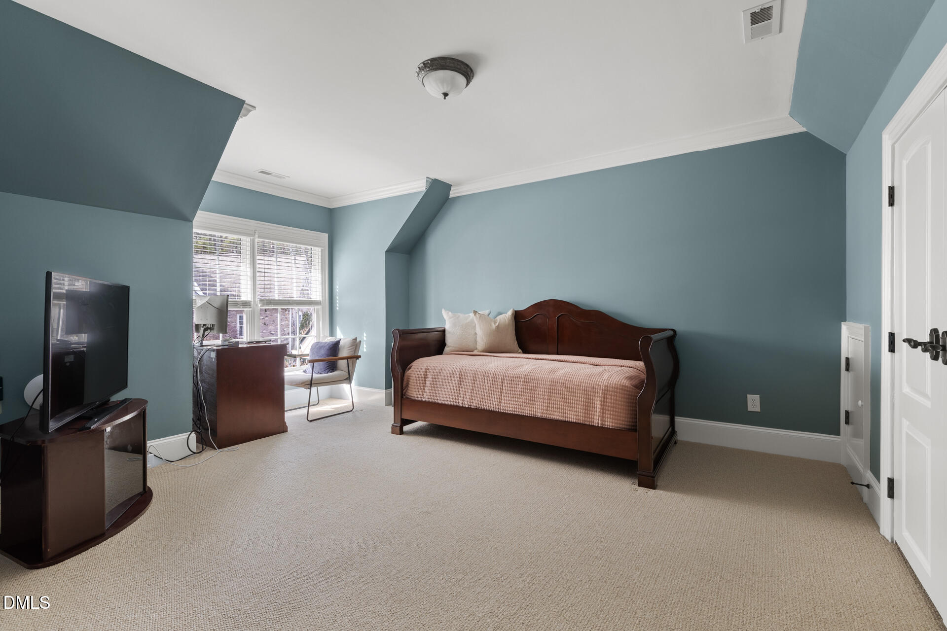 112 Winding Ridge Road Durham, NC 27713 - Photo 61 of 84 a bedroom with a bed and a couch