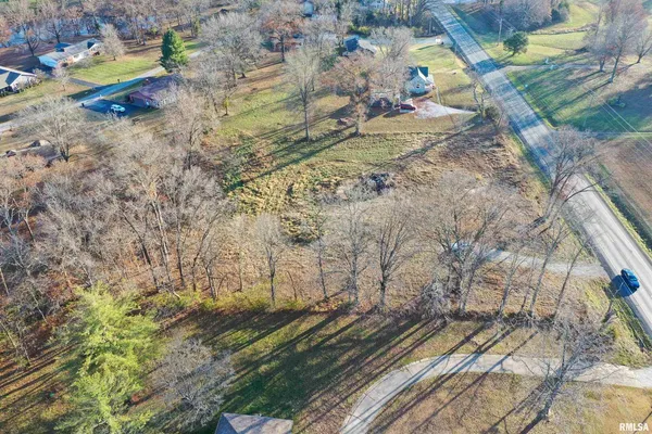a view of a backyard of a house