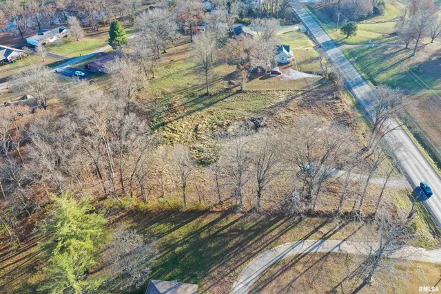 a view of a backyard of a house