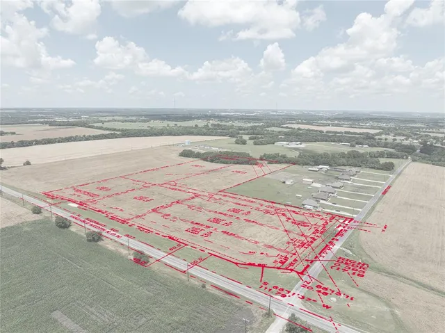 a view of a swimming pool with an outdoor seating