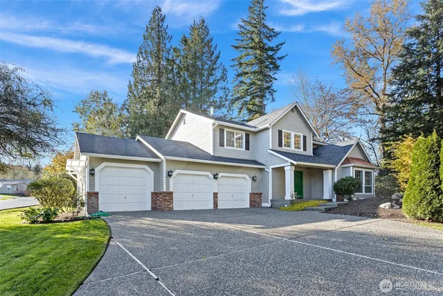a view of a yard in front of a house