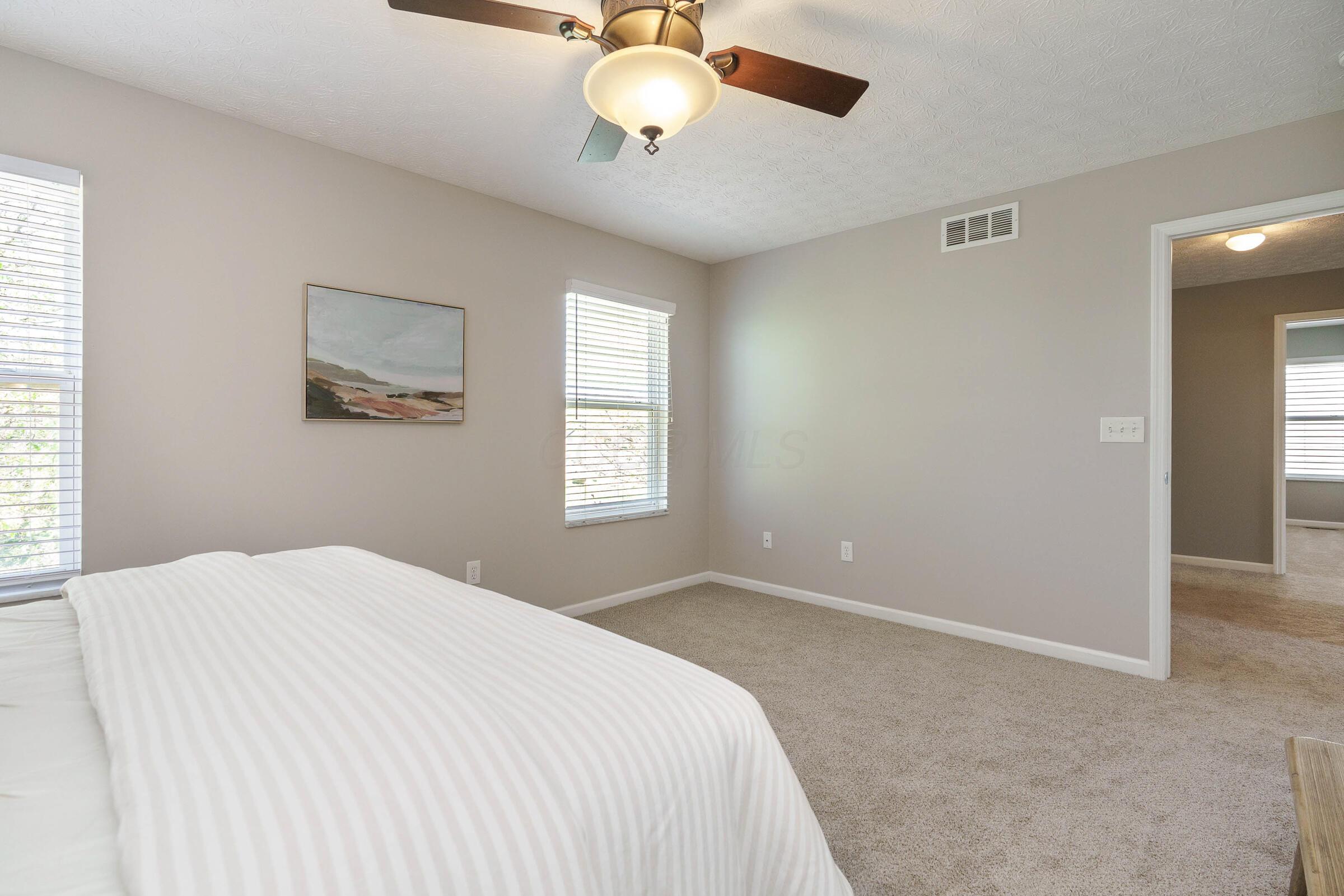 124 Stockard Loop Delaware, OH 43015 - Photo 19 of 54 Primary Suite