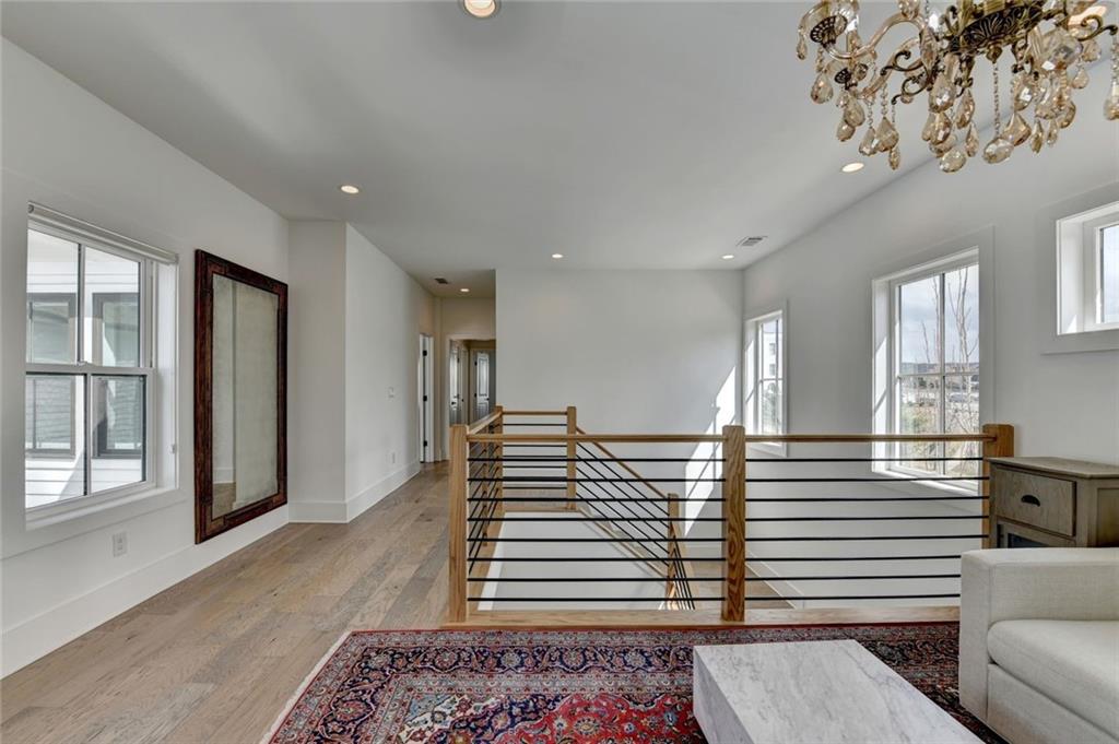 6785 Halcyon Way Alpharetta, GA 30005 - Photo 47 of 90 a view of a livingroom with furniture and windows