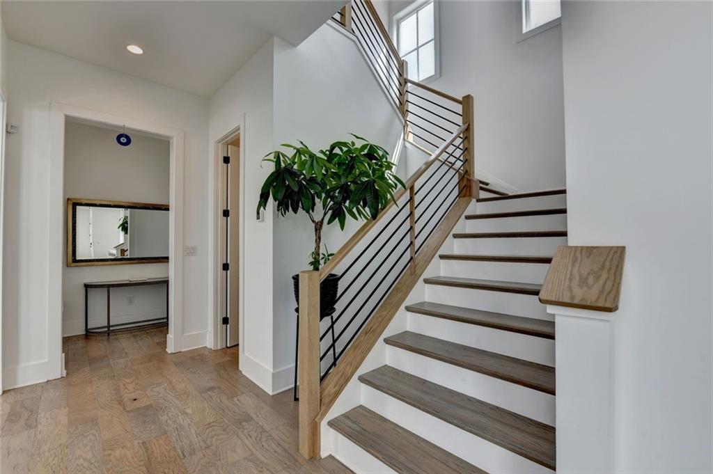 6785 Halcyon Way Alpharetta, GA 30005 - Photo 48 of 90 a view of entryway and hall with wooden floor