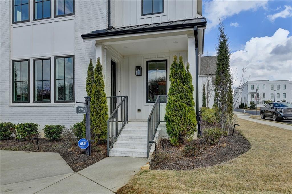6785 Halcyon Way Alpharetta, GA 30005 - Photo 5 of 90 a view of a house with a garden