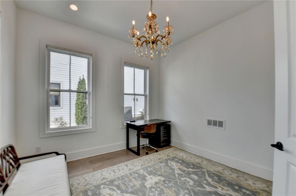 6785 Halcyon Way Alpharetta, GA 30005 - Photo 52 of 90 a view of a room with a window and furniture