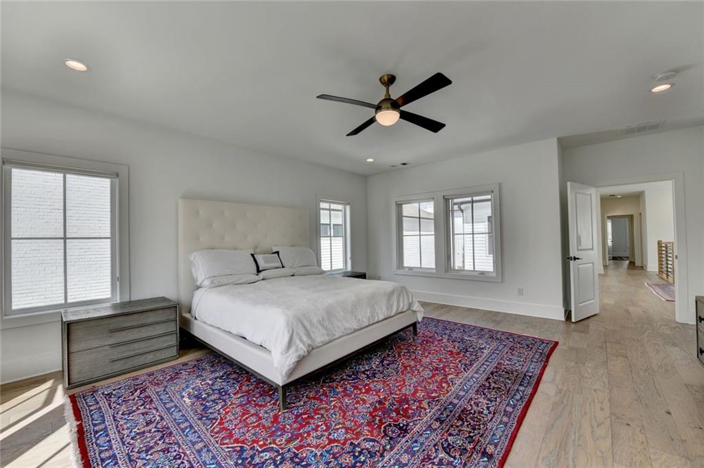 6785 Halcyon Way Alpharetta, GA 30005 - Photo 56 of 90 a bedroom with a bed and a window