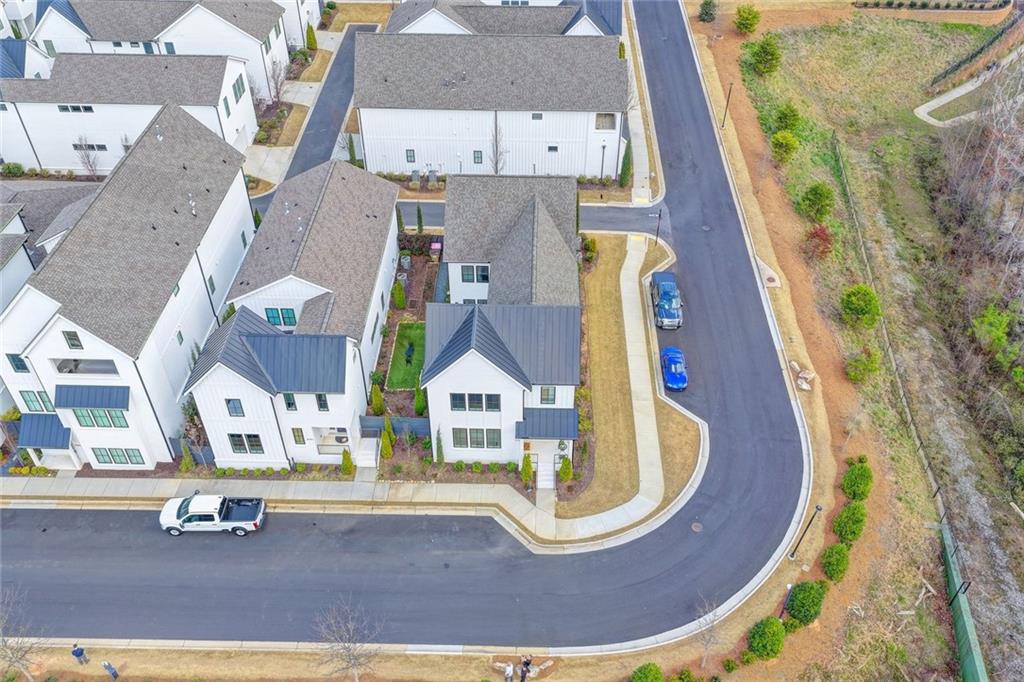 6785 Halcyon Way Alpharetta, GA 30005 - Photo 8 of 90 an aerial view of residential houses with outdoor space