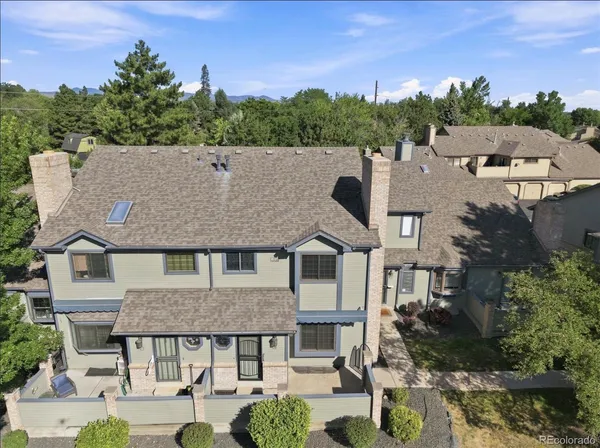 an aerial view of a house with a outdoor space