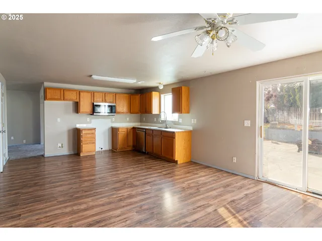 a view of kitchen with wooden floor