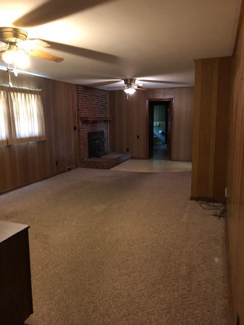 200 Tarpley Shop Road Pulaski, TN 38478 - Photo 7 of 19 a view of an empty room with a fireplace