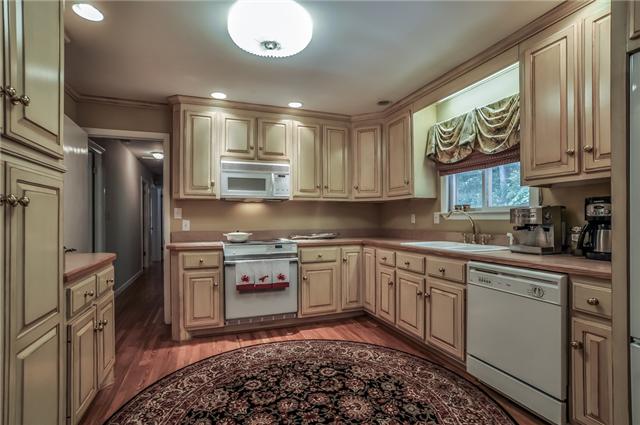 5734 Knob Road Nashville, TN 37209 - Photo 3 of 20 Remodeled Kitchen with New Cabinets, Applicances, plus a fireplace in the breakfast room!