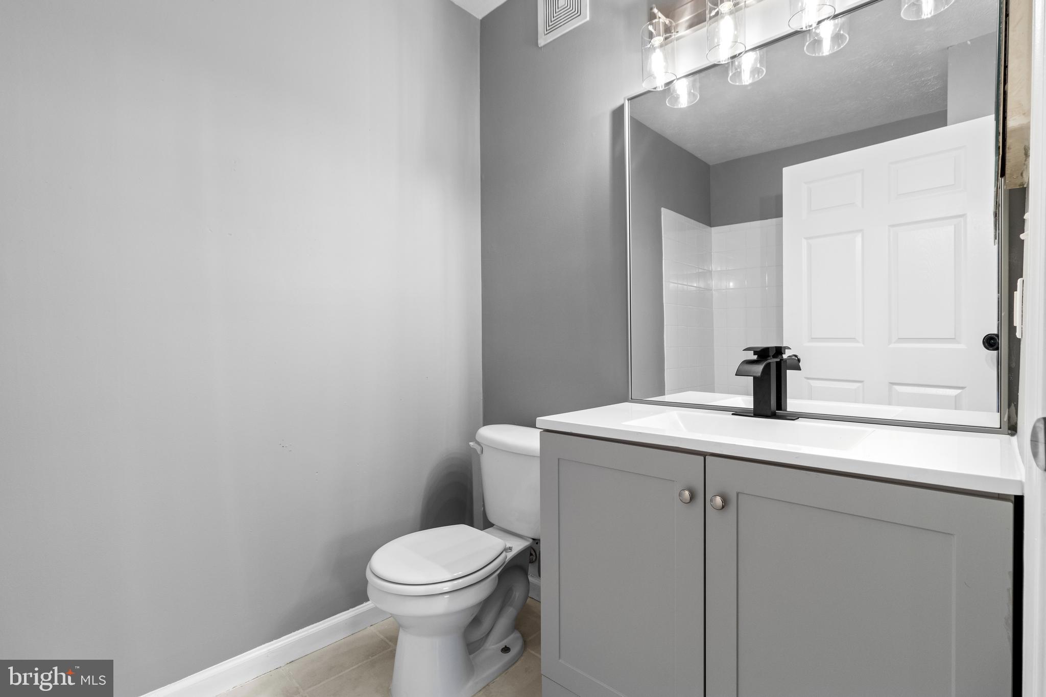 8931 Town Center Circle, Unit 101 Upper Marlboro, MD 20774 - Photo 4 of 20 Updated baths