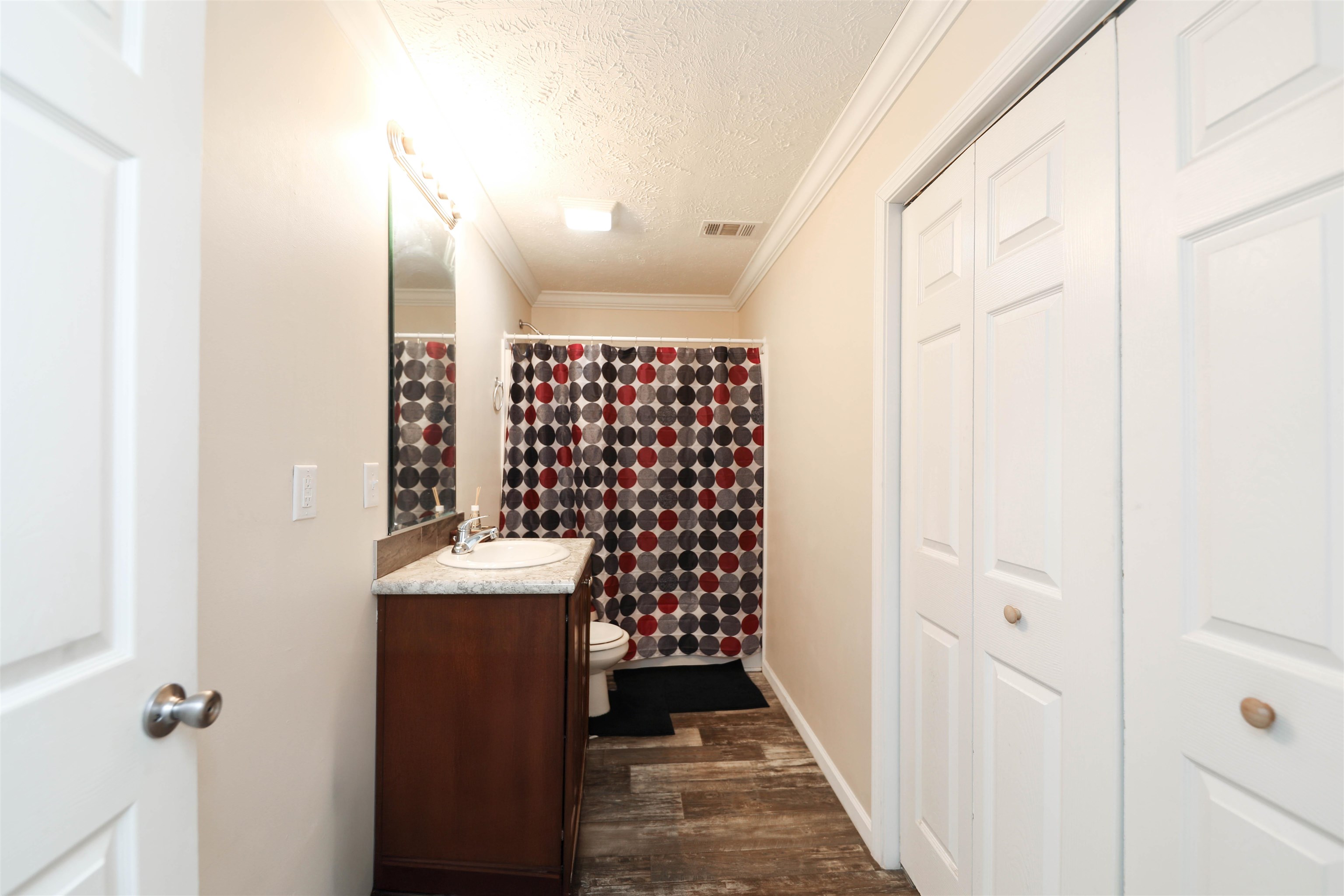 1601 A Street Waynesboro, VA 22980 - Photo 15 of 30 a bathroom with a sink a toilet and shower