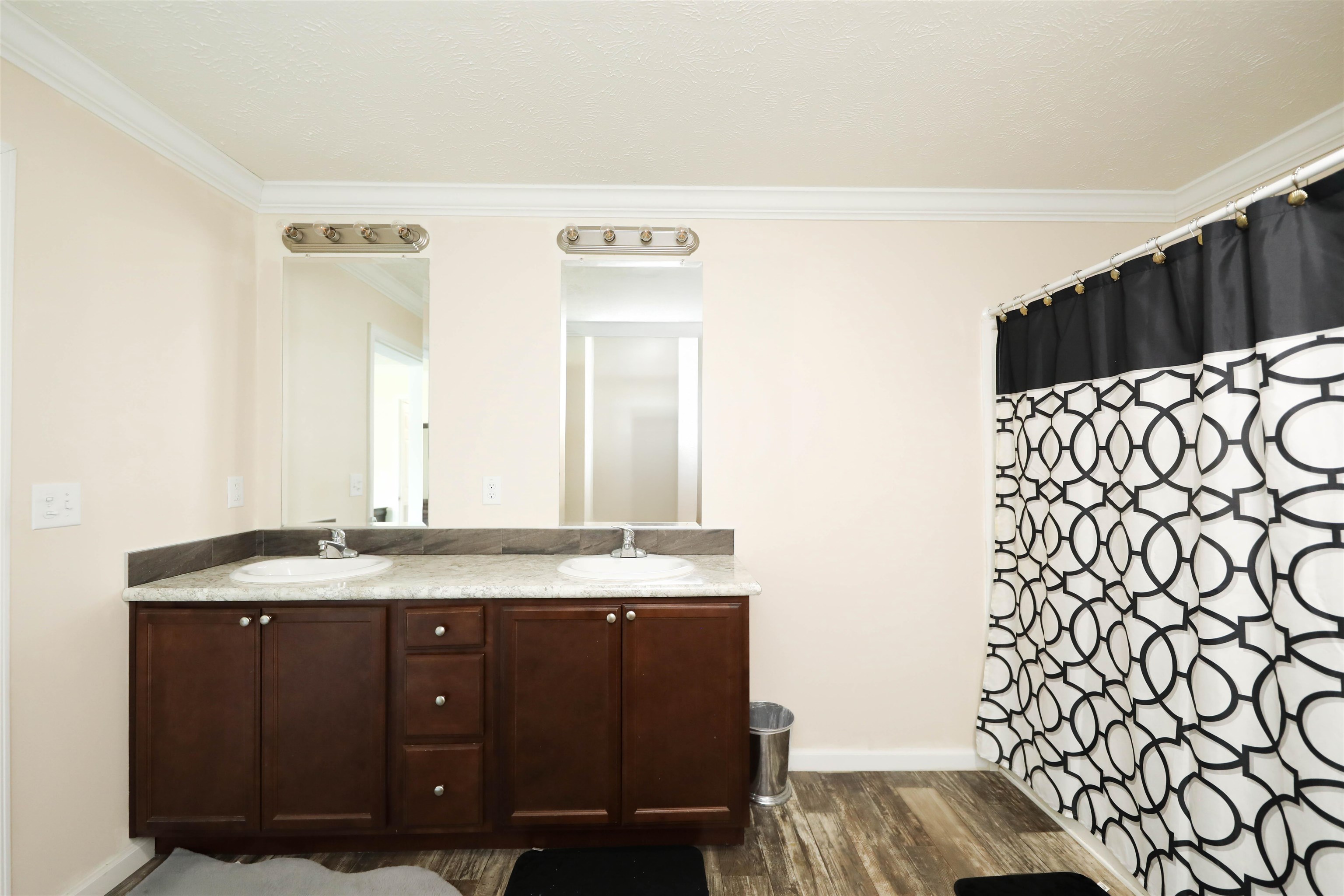 1601 A Street Waynesboro, VA 22980 - Photo 17 of 30 a bathroom with a granite countertop sink and a mirror