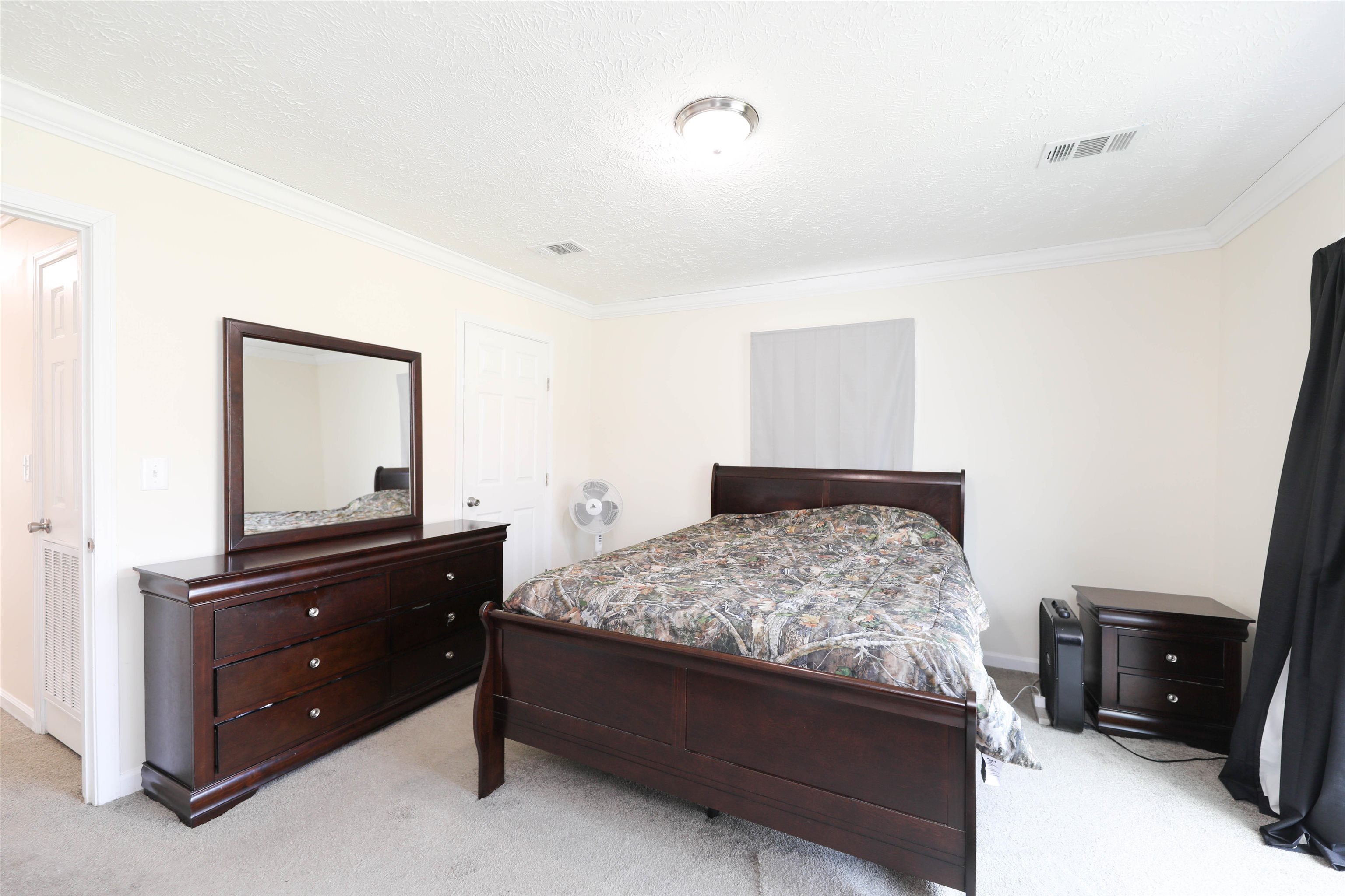 1601 A Street Waynesboro, VA 22980 - Photo 18 of 30 a bedroom with a bed and a dresser