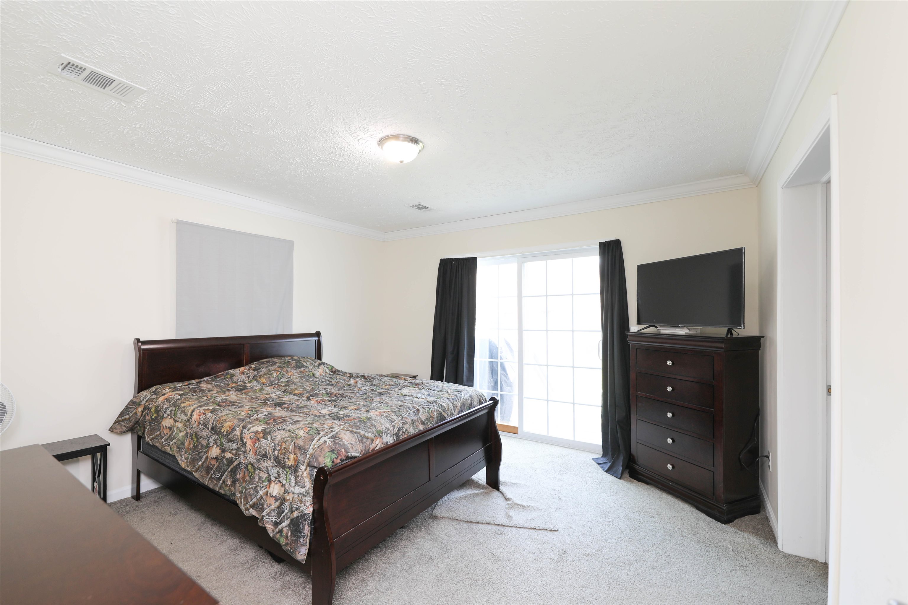 1601 A Street Waynesboro, VA 22980 - Photo 19 of 30 a bedroom with a bed and teddy bear on table