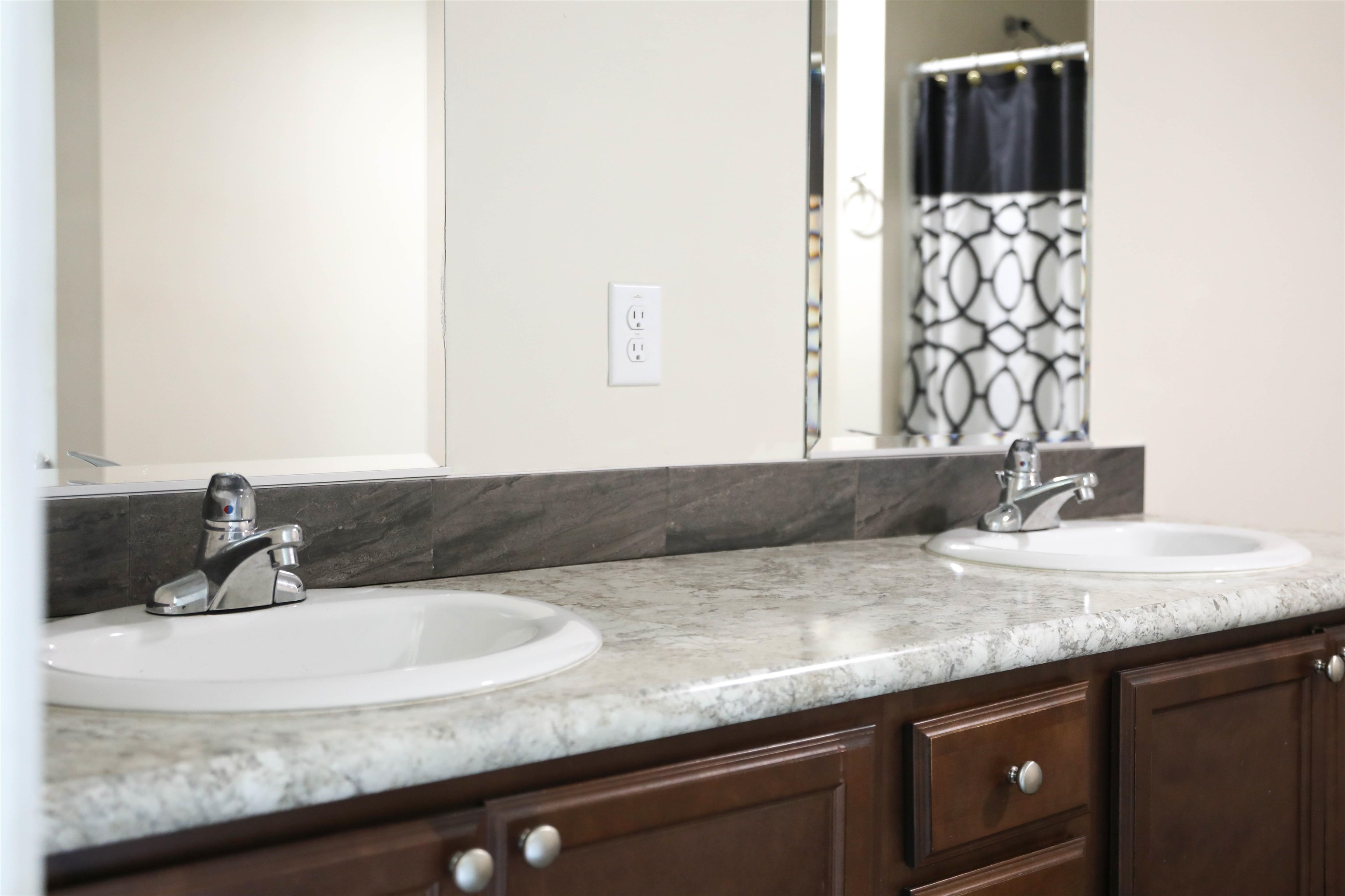 1601 A Street Waynesboro, VA 22980 - Photo 21 of 30 a bathroom with a granite countertop sink and a mirror