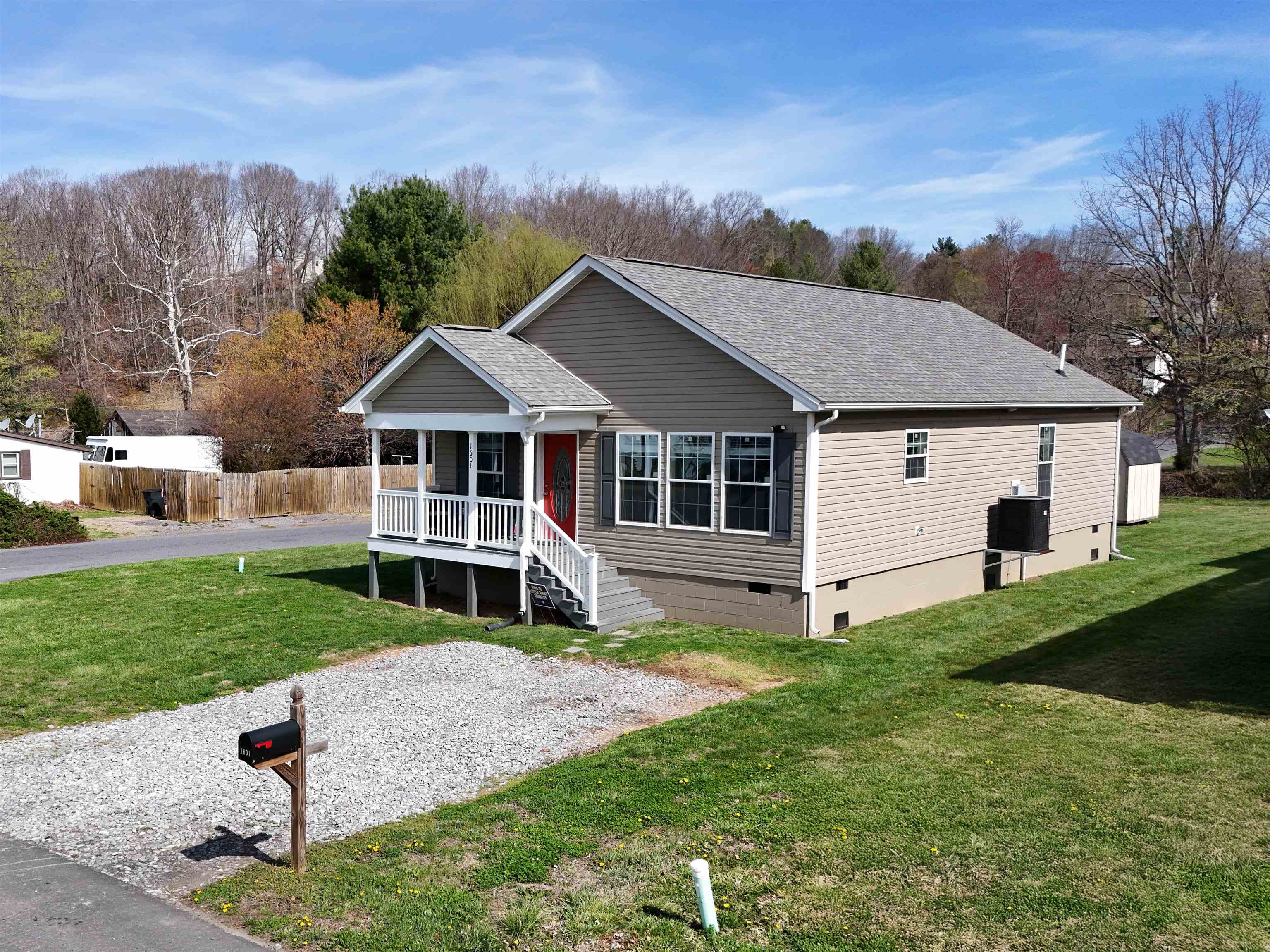 1601 A Street Waynesboro, VA 22980 - Photo 28 of 30 a aerial view of a house next to a big yard and large trees