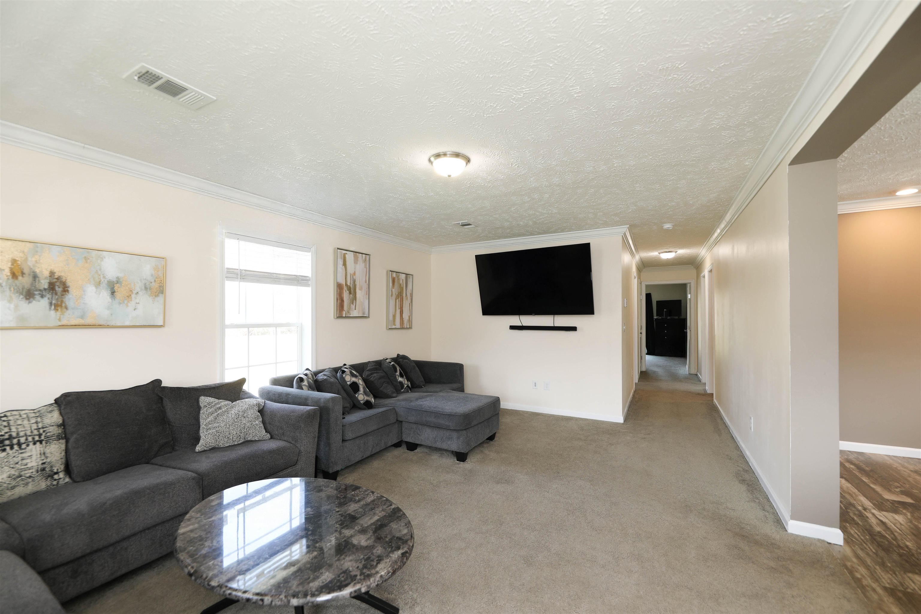 1601 A Street Waynesboro, VA 22980 - Photo 6 of 30 a living room with furniture and a flat screen tv