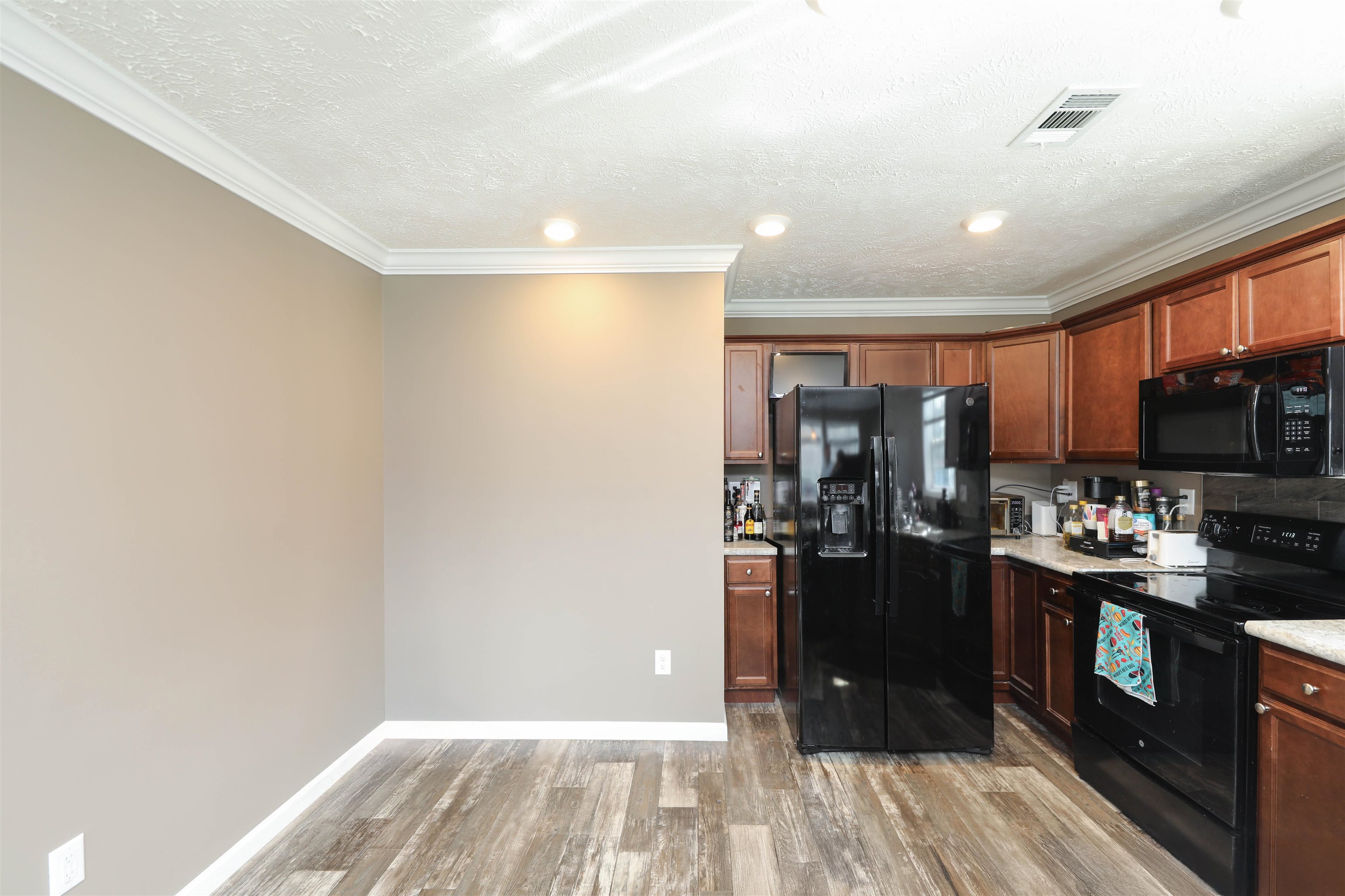 1601 A Street Waynesboro, VA 22980 - Photo 9 of 30 a kitchen with a refrigerator and a stove