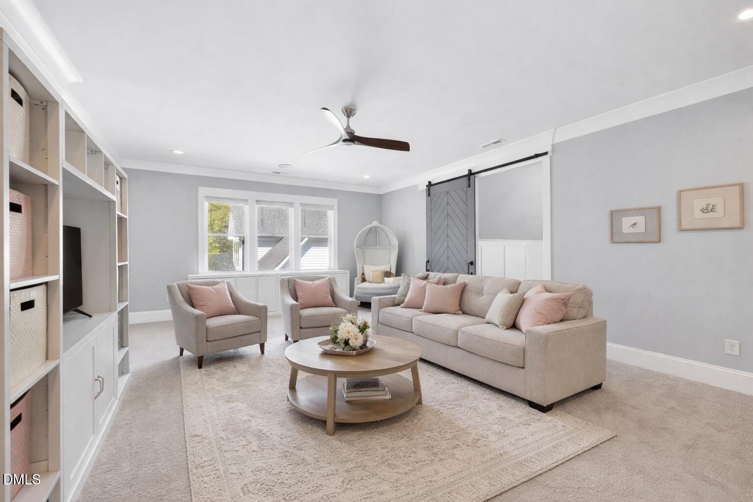 3419 Edgemont Drive Raleigh, NC 27612 - Photo 26 of 41 Cozy neutral living room with pink accen